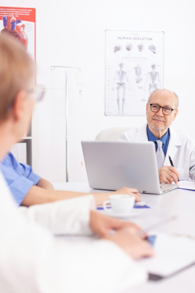 Medical expert talking with medical staff